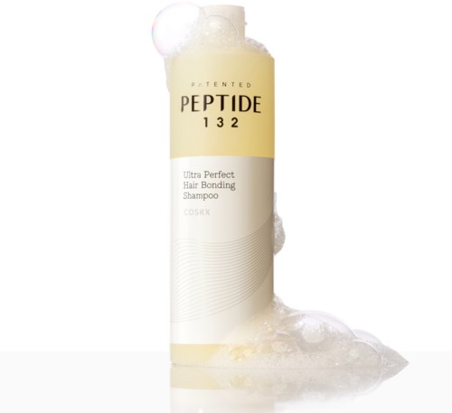 Een lange witte fles met gele dop, gemarkeerd 'PEPTIDE 132', zeepbellen eromheen, witte achtergrond.