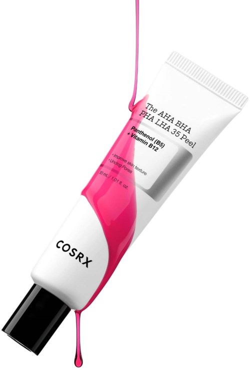 Een tube van COSRX huidverzorging met roze vloeistof die eruit loopt en een label dat zuren en B12 vitamine vermeldt.