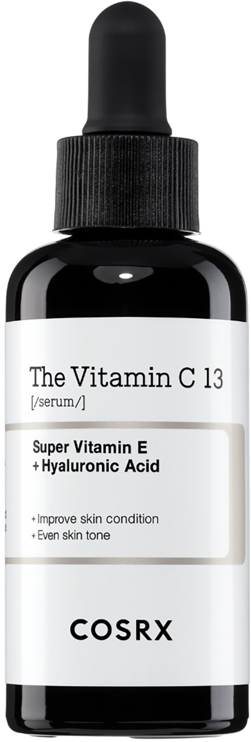 Donkere fles met pipet, met vitamine C-serum met vitamine E en hyaluronzuur voor de huid.