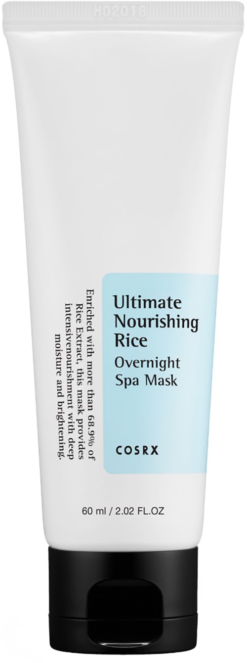 Eine weiße Tube mit Hautpflegeprodukt, beschriftet 'Ultimate Nourishing Rice Overnight Spa Mask' von COSRX.