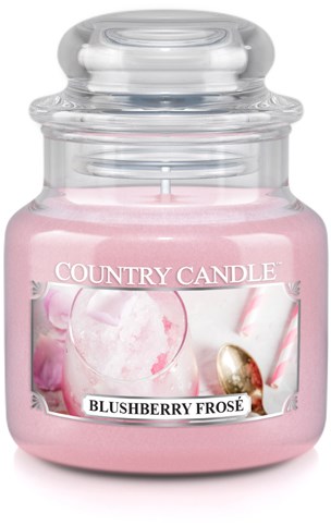 A pink candle in a glass jar with a clear lid, labeled "Country Candle" with a blushing berry scent.