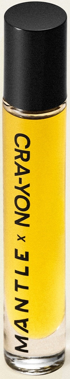 Geel parfumroller met zwarte dop en zwarte tekst 'CRAYON + MANTLE' op het label.