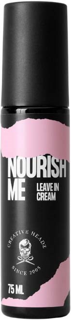 A black and pink spray bottle labeled "Nourish Me" leave-in cream, 75ml, with a logo of a skull and crossbones.