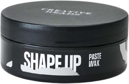 A round black container with white text, labeled "Shape Up Paste Wax," used for hair styling.