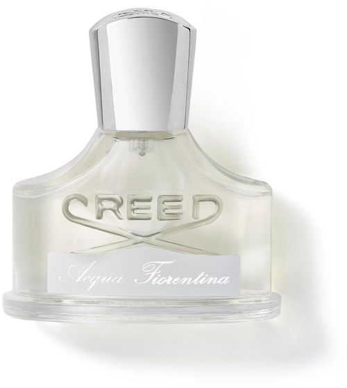 En parfymflaska märkt 'Creed Aqua Fiorentina' med tydlig, kurvig design och metallock.