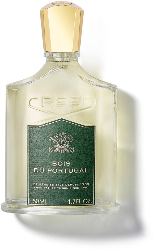 En tydlig glasparfymflaska med guldlock och en grön etikett som säger 'Bois du Portugal' och ytterligare text.