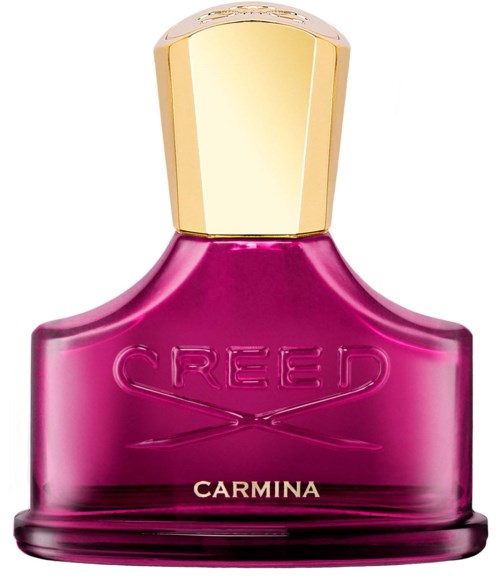 En rosa parfymeflaske med gullhette, merket 'Creed Carmina'.