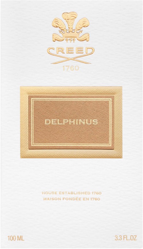 En ljuslåda med guld- och vitt detaljer, med Creed-loggan, ordet Delphinus och storleksinformation för produkten.