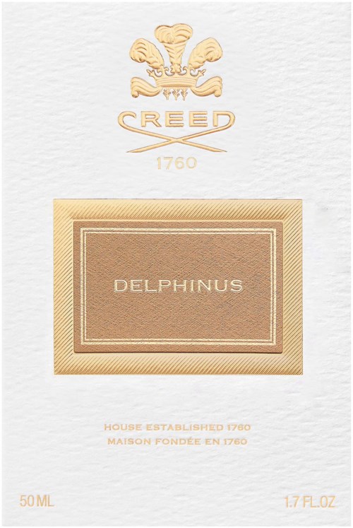 Lyxig förpackning för Delphinus av Creed, med guldkristyr och beige etikett med produkt- och storleksinformation.