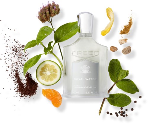 En klar flaske med Creed Royal Water-parfyme omgitt av sitron, urter, krydder og naturlige ingredienser.
