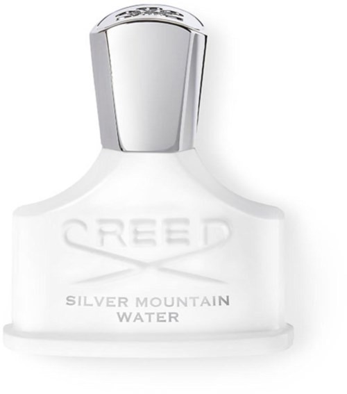 En hvit parfymeflaske med sølvhette og preget tekst: 'CREED SILVER MOUNTAIN WATER.'