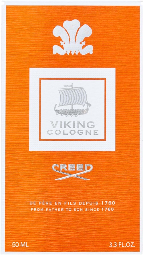Oransje emballasje med en hvit logo av en lilje, en skipillustrasjon og tekst om Viking Cologne og Creed.