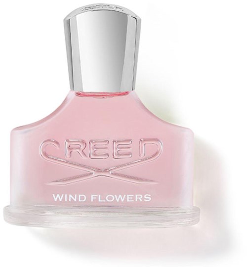 Rosa parfymflaska med silverlock, märkt 'CRED Wind Flowers'.