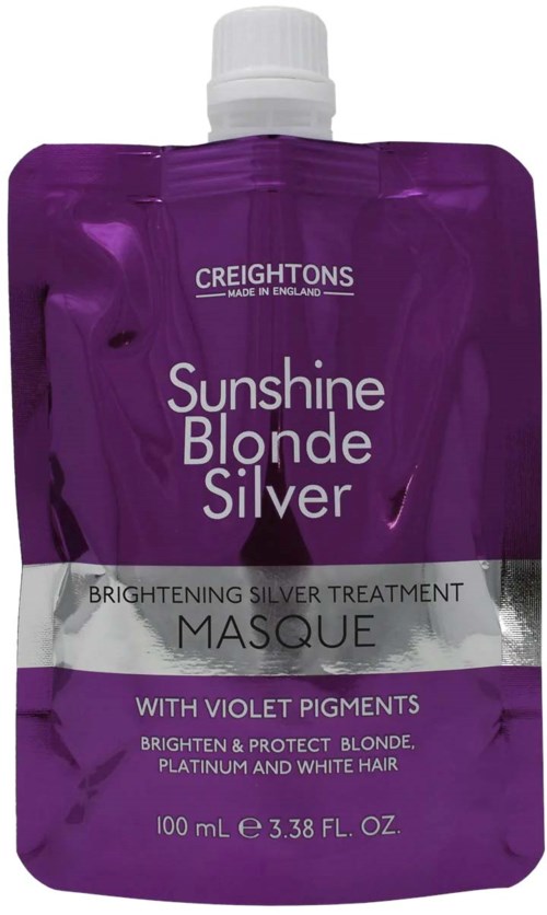 A purple sachet with a white cap, labeled as a brightening silver treatment masque with violet pigments.