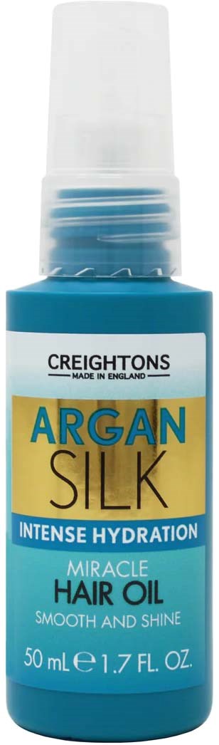 A blue bottle of argan silk hair oil for intense hydration and shine.