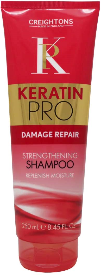 Red and gold tube of Keratin Pro Damage Repair Shampoo, 250 ml, for strengthening and moisturizing hair.