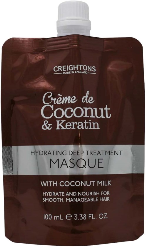 A brown pouch with white cap, labeled as hydrating hair mask with coconut milk and keratin for smooth hair.