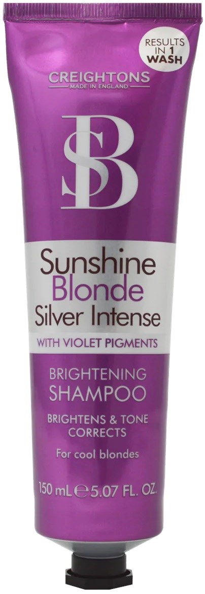 A purple tube of shampoo labeled 'Sunshine Blonde' for brightening and toning blonde hair with violet pigments.