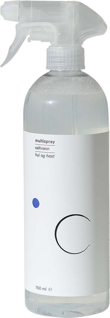 En sprayflaska med vit etikett, en blå prick och en svart kurvadesign.