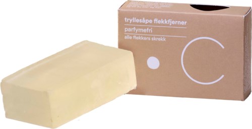 En tvålkaka och en kartongförpackning med text, troligen för att ta bort loppor.