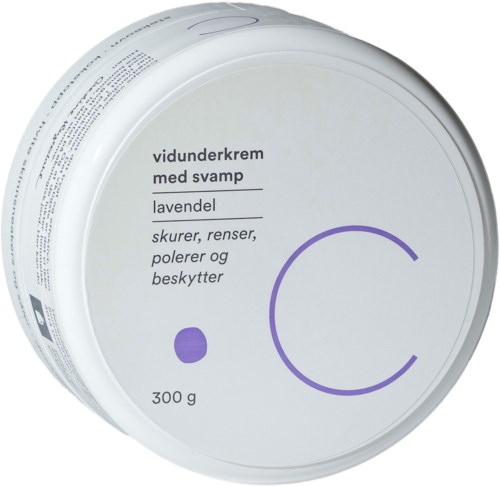A round container with white lid and label. The label has text about a cream with lavender and its uses.