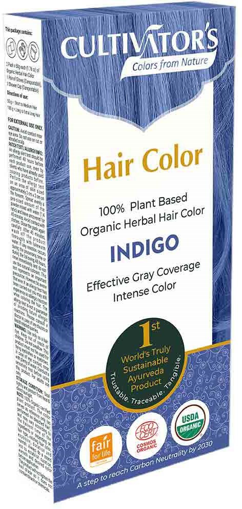 Een doos haarverf met blauwe en witte verpakking, vermeldt natuurlijke ingrediënten en duurzame productkenmerken.