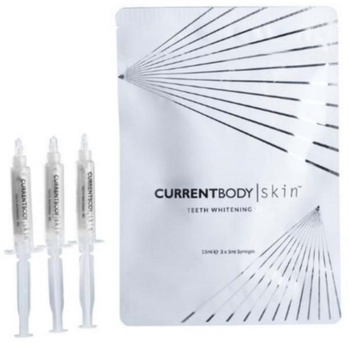Zahnaufhellungsset mit drei Spritzen und einer Schachtel mit der Aufschrift 'CurrentBody Skin'.