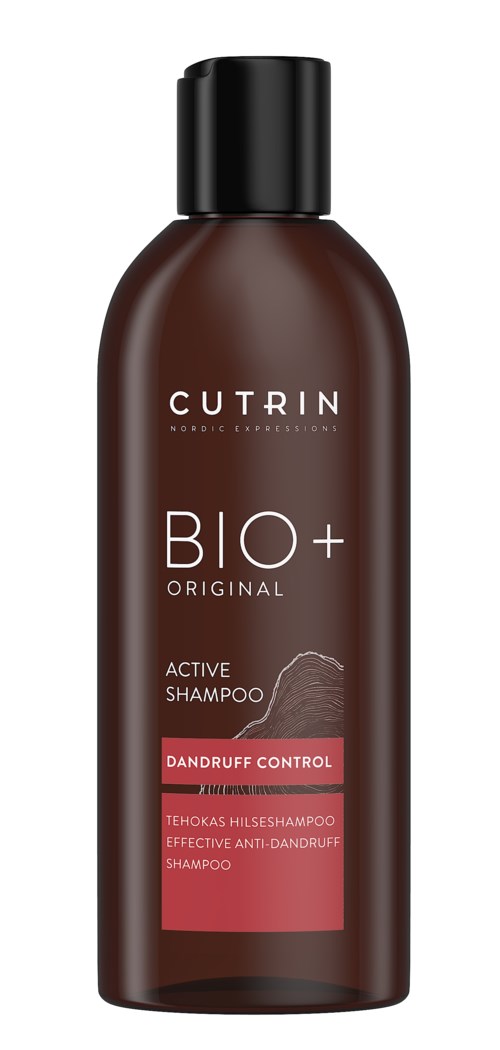 A brown shampoo bottle with a black cap, labeled 'CUTRIN BIO+ Original Active Shampoo Dandruff Control.'