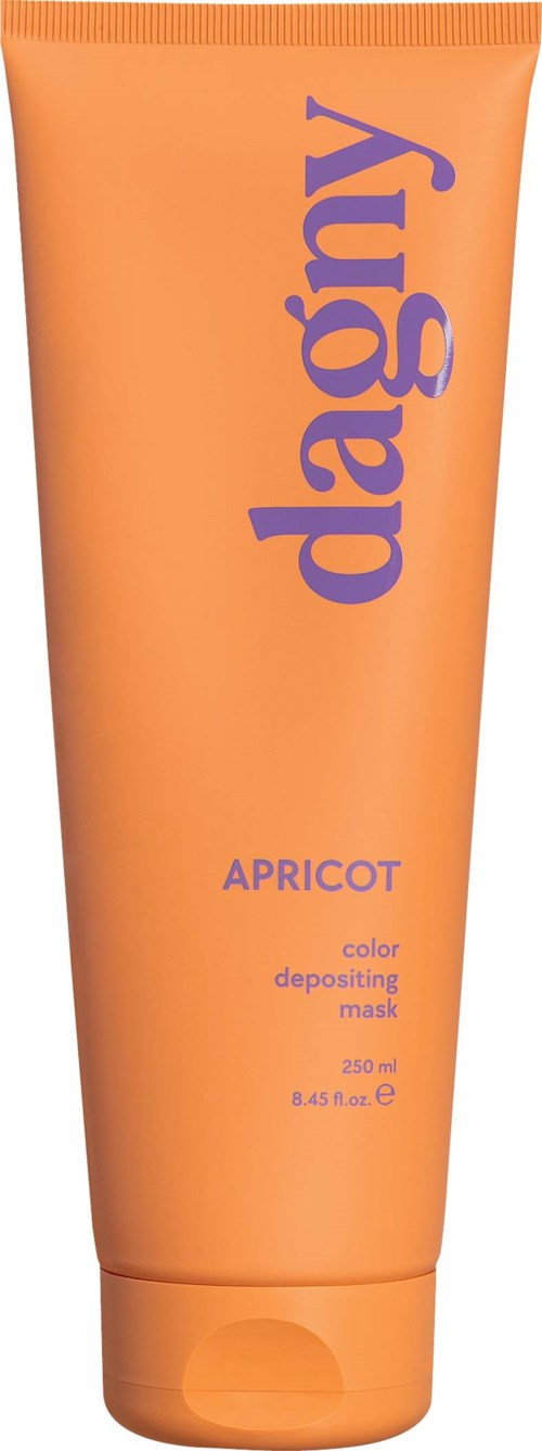A peach-colored tube with blue text says Dagy apricot color mask. It is a beauty or skincare product.