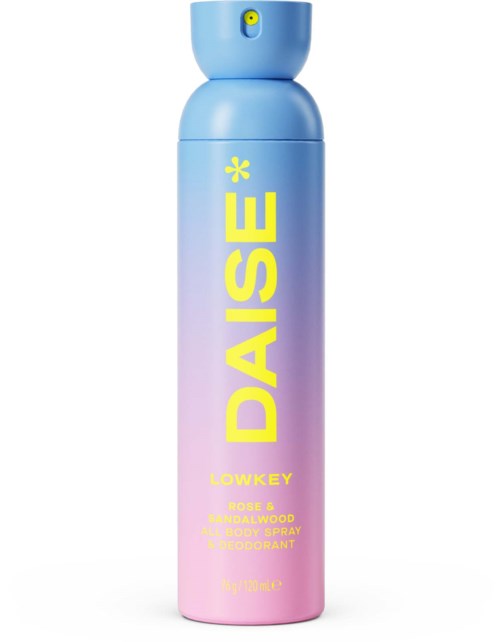 A pastel-colored bottle with a blue cap, labeled Daisy Lowkey Rose and Sandalwood body spray and deodorant.
