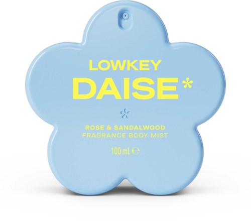 Blue flower-shaped fragrance body mist container with yellow text mentioning the scent rose and sandalwood.