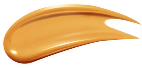 Een strook van goudkleurige crème of make-up met een gladde, glanzende textuur die spits toeloopt aan één uiteinde.