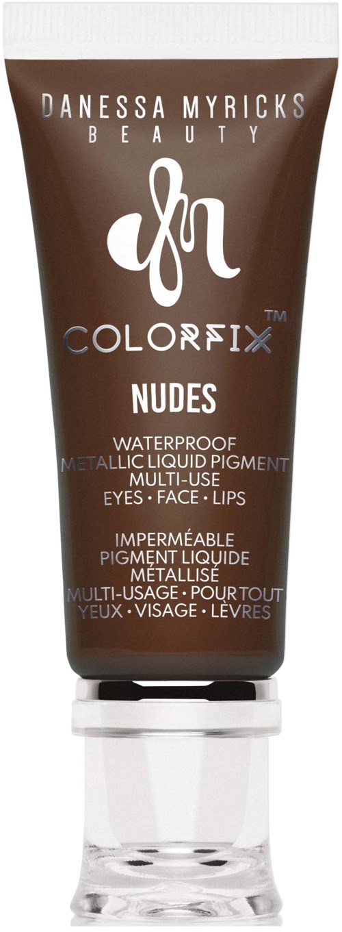 Bruine tube met witte en zilveren tekst voor Danessa Myricks Beauty waterdichte vloeibare pigment voor ogen, gezicht, lippen. Bevat productnaam.