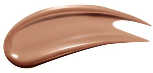 Een gladde, glanzende, beige kleurige cosmetische verf met een spitse rand.