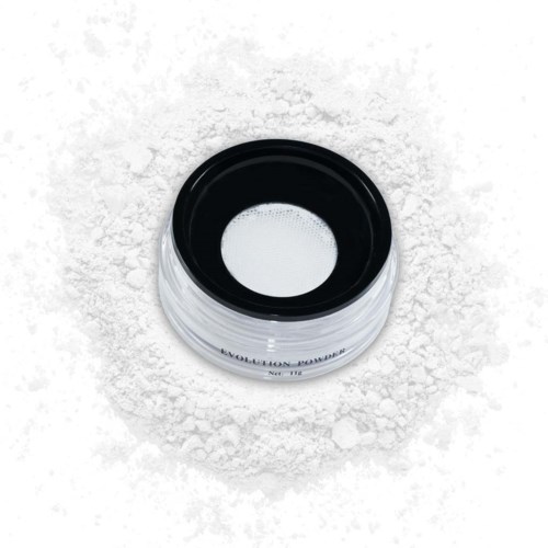 A container with a black lid, placed on a white powdery surface.