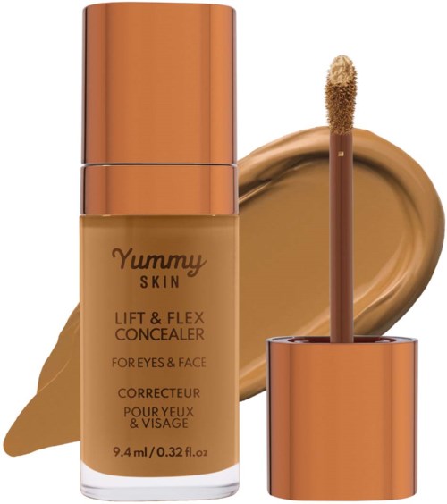 Foundation bottle with a doe-foot applicator and a beige makeup swatch behind it.