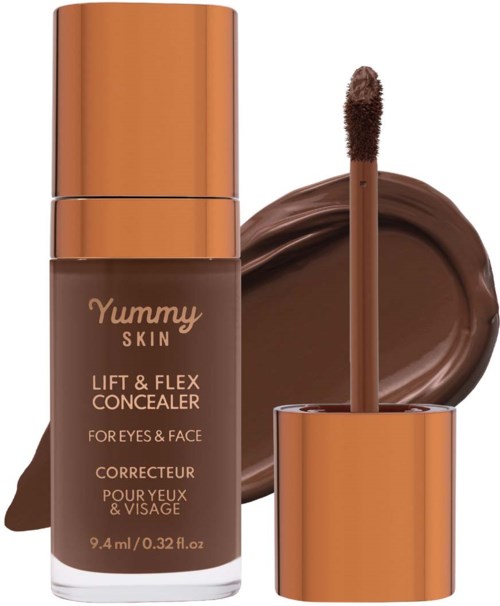 A bottle of Yummy Skin Lift & Flex Concealer beside a swatch of brown concealer with a doe-foot applicator.