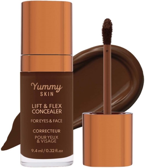 A bottle of concealer with a swatch and applicator showing. The product is called Yummy Skin Lift & Flex Concealer.