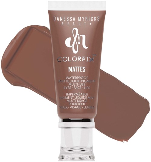 Danessa Myricks Beauty waterproof matte liquid pigment for eyes, face, and lips in a brown shade.