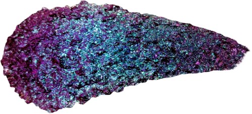 A swatch of iridescent blue and purple glitter eyeshadow.