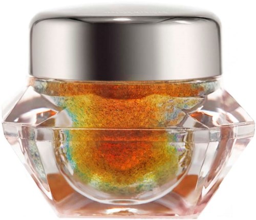 A clear glass jar with a silver lid contains colorful, shimmery loose powder.
