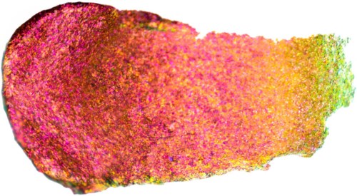 Colorful makeup swatch blending pink, orange, yellow, and green shades.