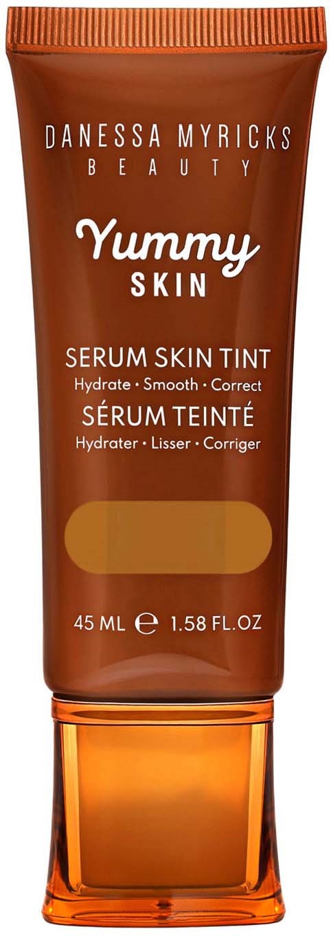 A brown tube of Danessa Myricks Beauty Yummy Skin Serum Skin Tint standing upright.
