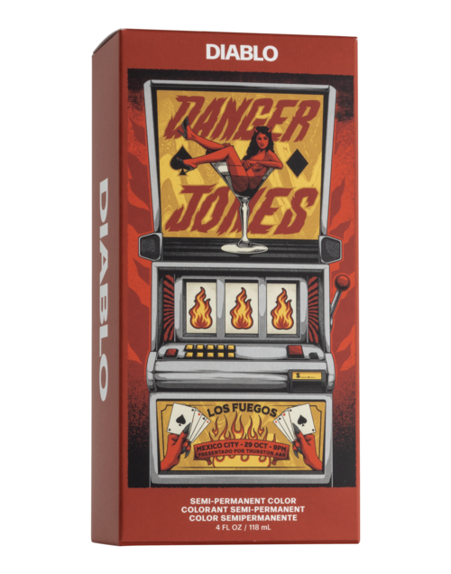 Eine Schachtel mit einem Spielautomatenbild, einer tanzenden Frau und Text über eine Veranstaltung in Mexiko-Stadt.