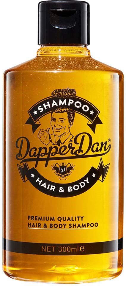 Keltainen Dapper Dan -shampoopullo, musta kansi ja logo, jossa mies kiillotetulla hiusmallilla.