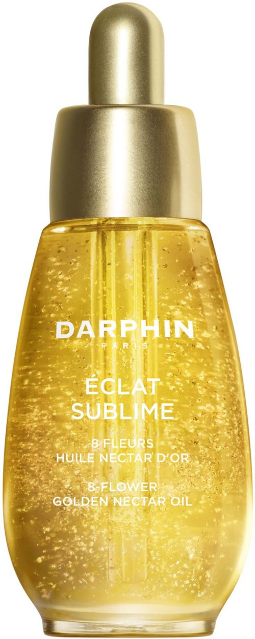 Eine goldfarbene Serumflasche mit Pipettendeckel, beschriftet 'Darphin Eclat Sublime' mit glitzernder Flüssigkeit innen.