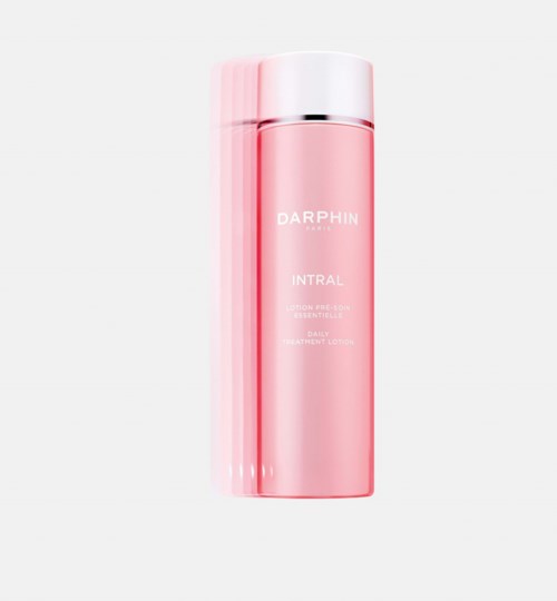 Pinkfarbene zylindrische Flasche mit weißen Deckel, beschriftet "DARPIN INTRAL" für Hautpflege.