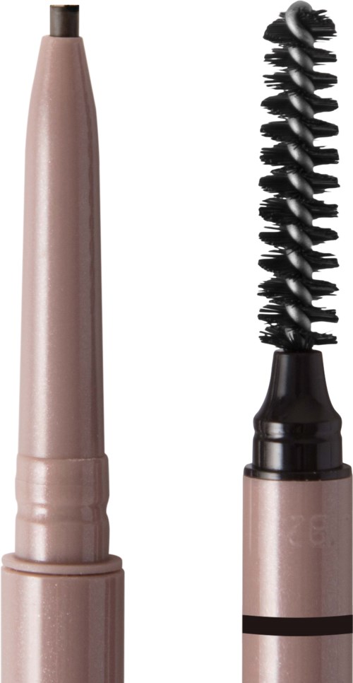 A beige tube with a black spoolie brush attached, used for eyebrow grooming or mascara application.
