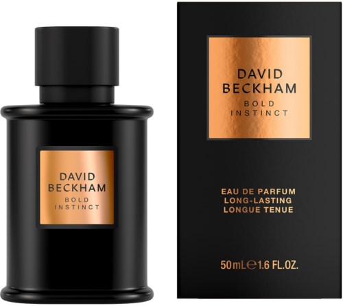 Eine schwarze Parfüfflasche und Schachtel mit orangenen Etiketten, anzeigen "David Beckham Bold Instinct" und Details.