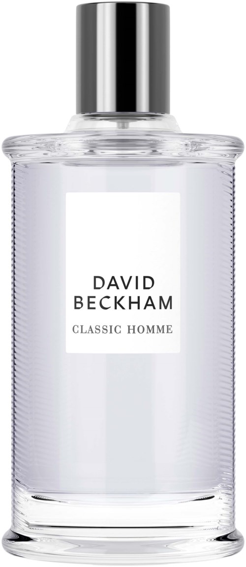 Eine klare Glaspflasche mit silberner Kappe, beschriftet 'David Beckham Classic Homme' für Herrendüfte.
